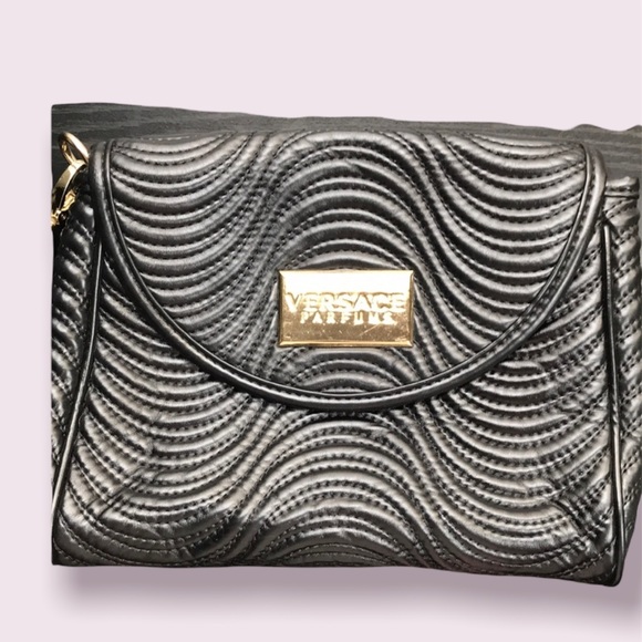 Versace Handbags - Versace textured wristlet